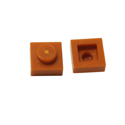 LEGO® Placa 1x1 en naranja oscuro, un elemento básico versátil ideal para detalles, espaciado y conexiones precisas de MOC.
