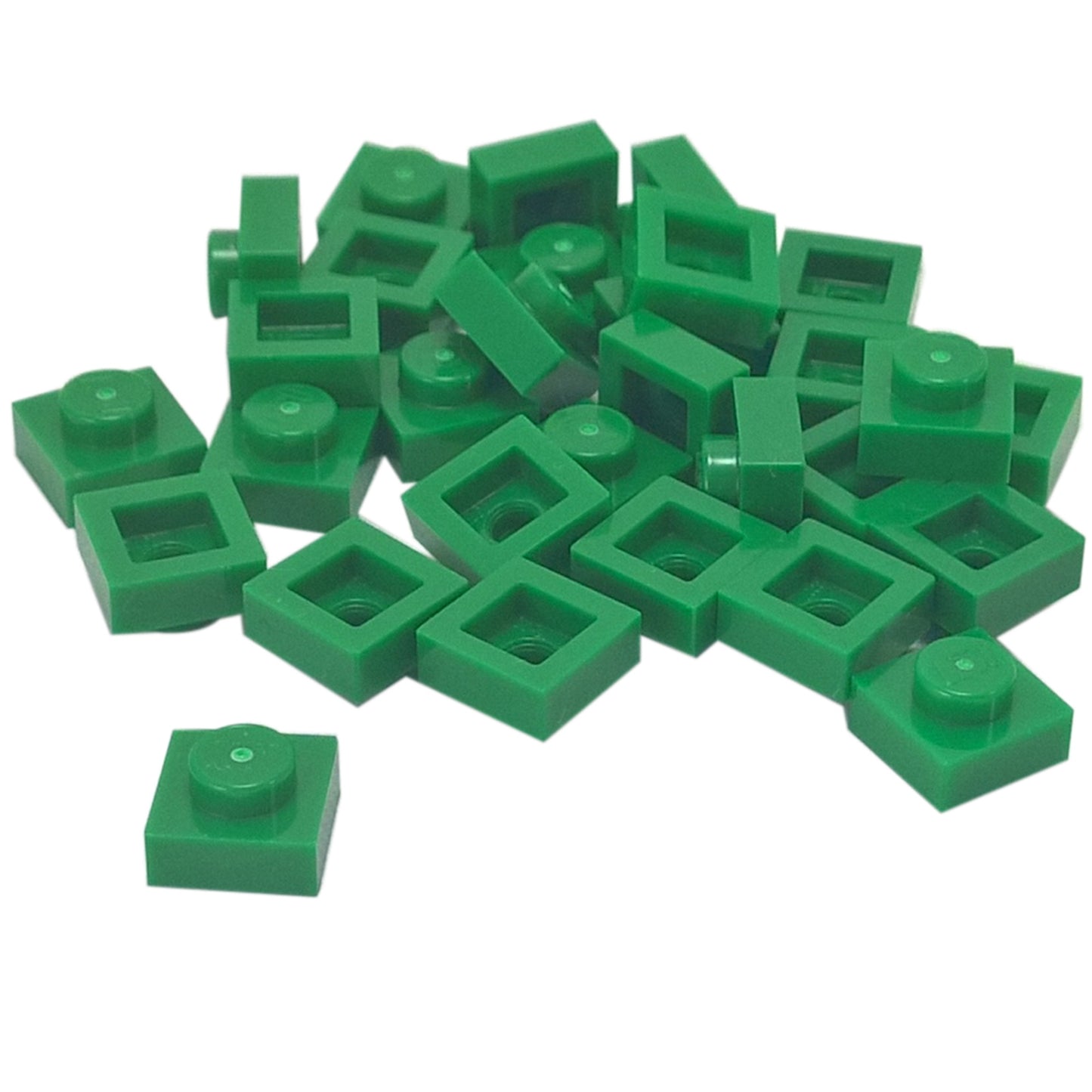 LEGO® Placa 1x1 en verde, un elemento básico versátil ideal para detalles, espaciado y conexiones precisas de MOC.
