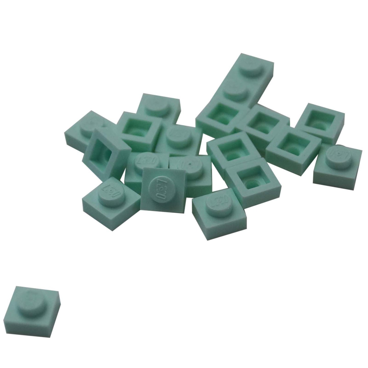 LEGO® Placa 1x1 en aqua claro, un elemento básico versátil ideal para detalles, espaciado y conexiones precisas de MOC.
