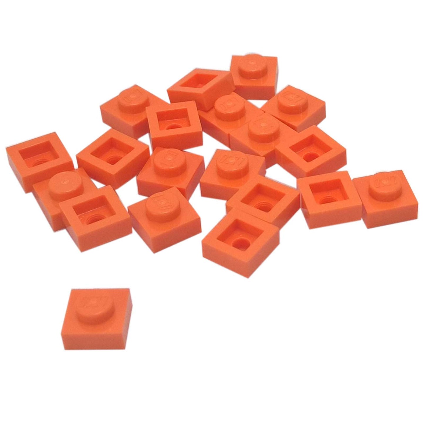 LEGO® Placa 1x1 en naranja, un elemento básico versátil ideal para detalles, espaciado y conexiones precisas de MOC.
