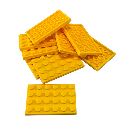 LEGO® Plate 4 x 6 (3032) in standard rectangular shape for building bases, platforms, and structural support in bright light orange.