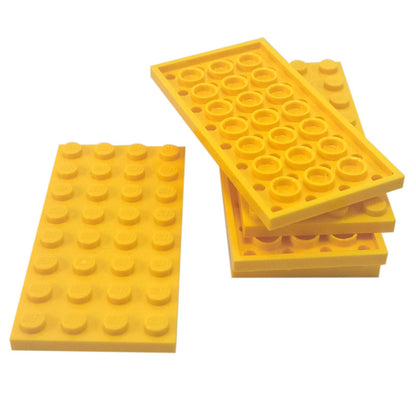 LEGO® Piastra 4 x 8 (3035) pezzo base rettangolare per creare piattaforme robuste e supporto strutturale in giallo.