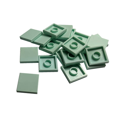 LEGO Tile 2 x 2 part 3068 with smooth square top and underside connection ring light aqua
