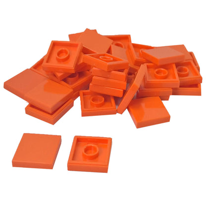 LEGO Tile 2 x 2 part 3068 with smooth square top and underside connection ring orange