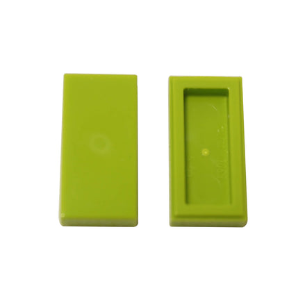 LEGO Tile 1 x 2 part 3069 with smooth rectangular top and recessed underside lime