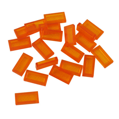 LEGO Tile 1 x 2 part 3069 with smooth rectangular top and recessed underside trans-orange