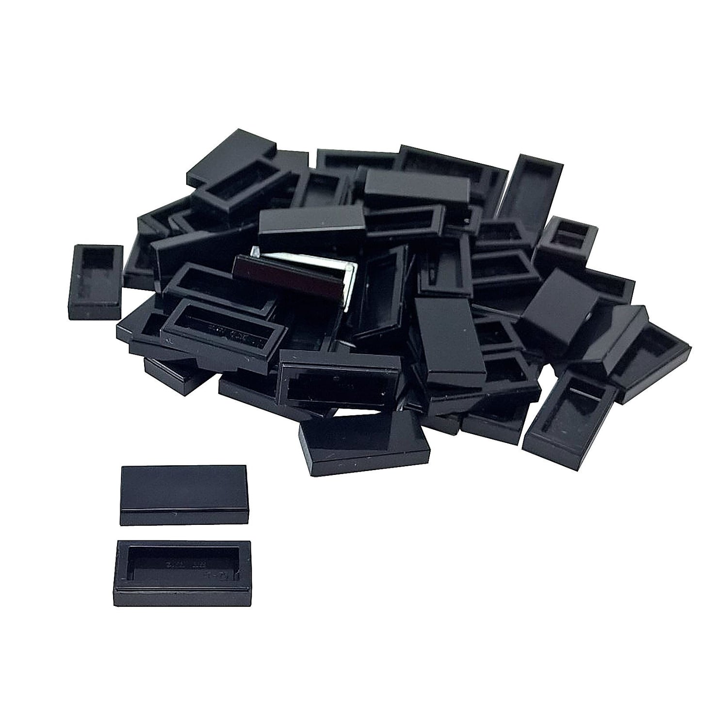 LEGO Tile 1 x 2 part 3069 with smooth rectangular top and recessed underside black