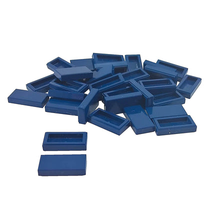 LEGO Tile 1 x 2 part 3069 with smooth rectangular top and recessed underside dark blue