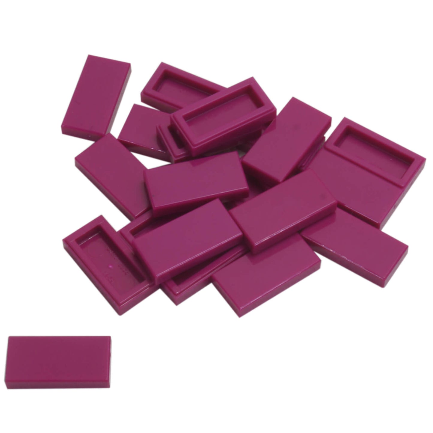 LEGO Tile 1 x 2 part 3069 with smooth rectangular top and recessed underside magenta