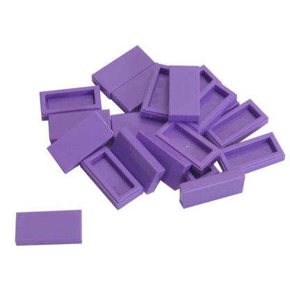 LEGO Tile 1 x 2 part 3069 with smooth rectangular top and recessed underside medium lavender