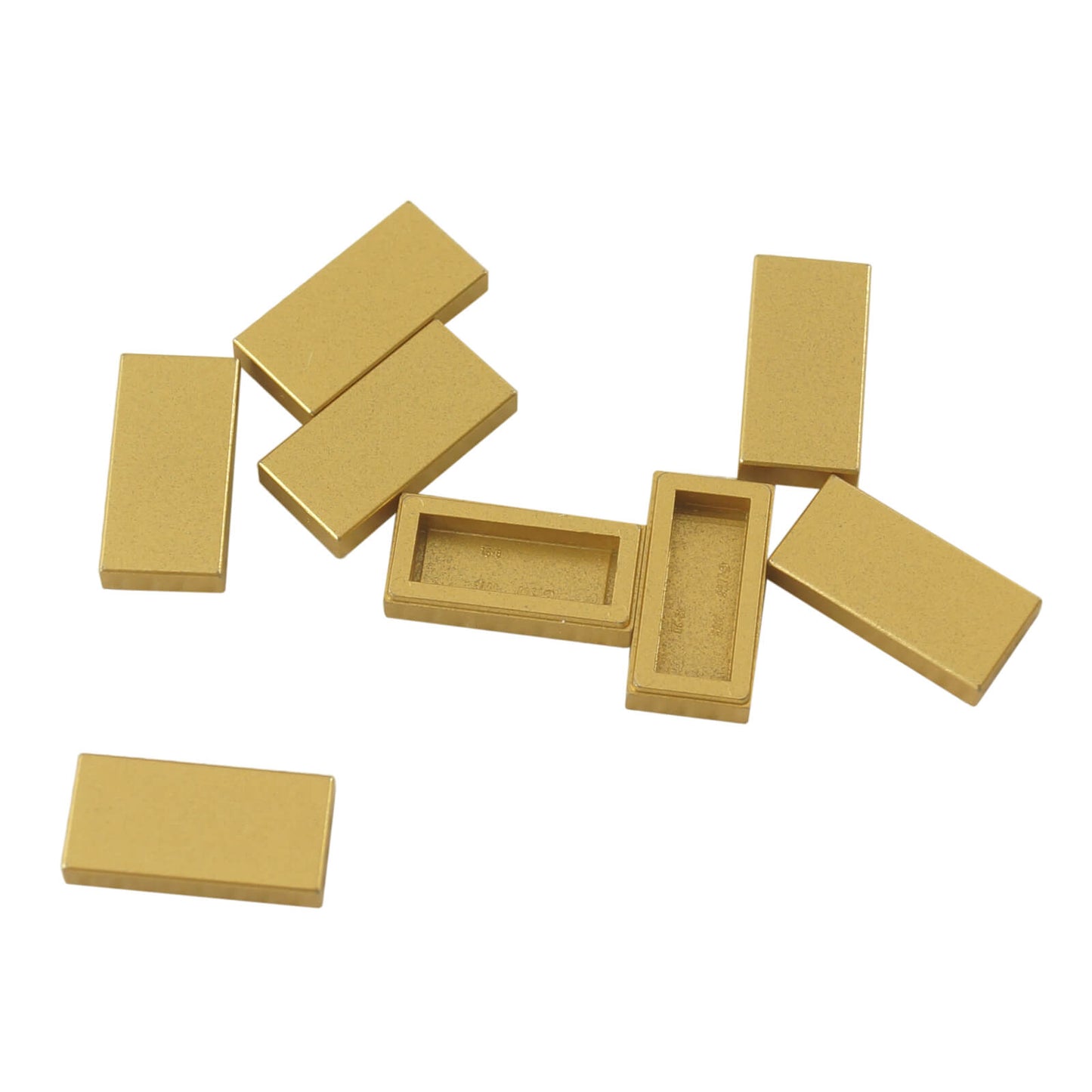 LEGO Tile 1 x 2 part 3069 with smooth rectangular top and recessed undersidemettalic gold
