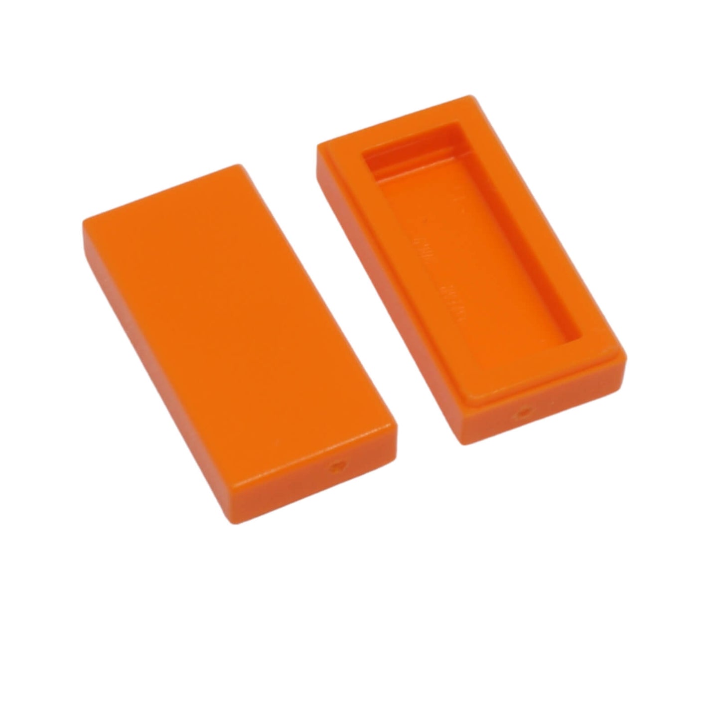 LEGO Tile 1 x 2 part 3069 with smooth rectangular top and recessed underside orange