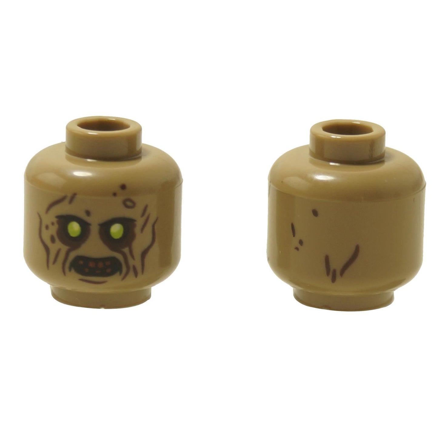 Two tan LEGO Alien Zombie minifigure heads (3626pb3650) showing lime green eyes and dark brown markings.