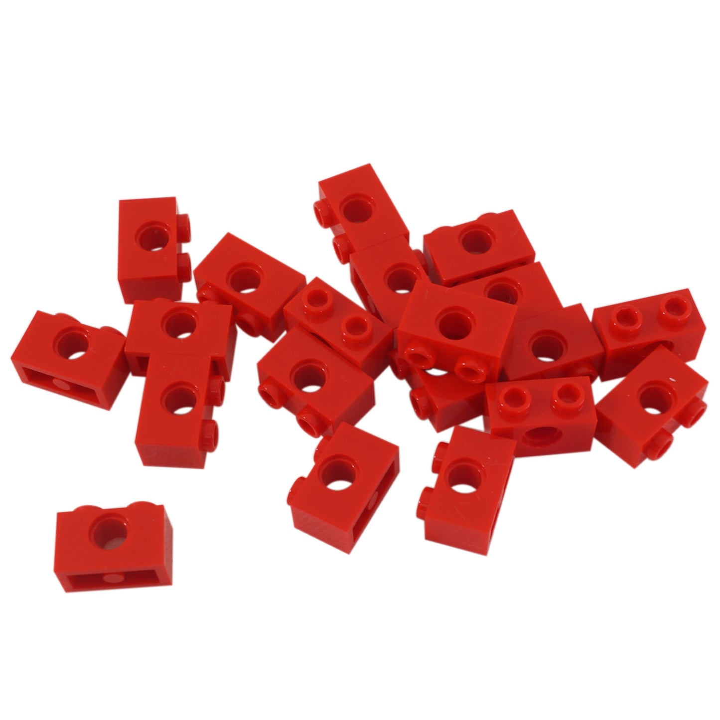 LEGO Technic Brick 1 x 2 with Hole in Red (Part 3700) used for Technic pins, axles, and structural connections in LEGO builds