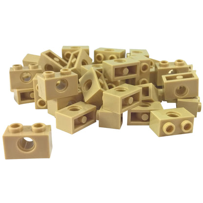 LEGO Technic Brick 1 x 2 with Hole in Tan (Part 3700) used for Technic pins, axles, and structural connections in LEGO builds