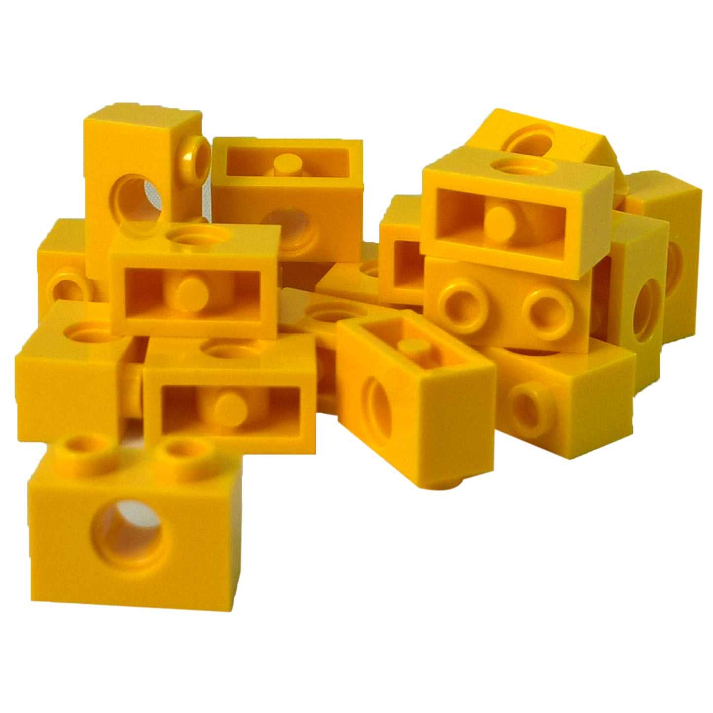 LEGO Technic Brick 1 x 2 with Hole in Yellow (Part 3700) used for Technic pins, axles, and structural connections in LEGO builds