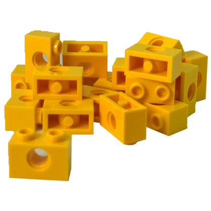 LEGO Technic Brick 1 x 2 with Hole in Yellow (Part 3700) used for Technic pins, axles, and structural connections in LEGO builds
