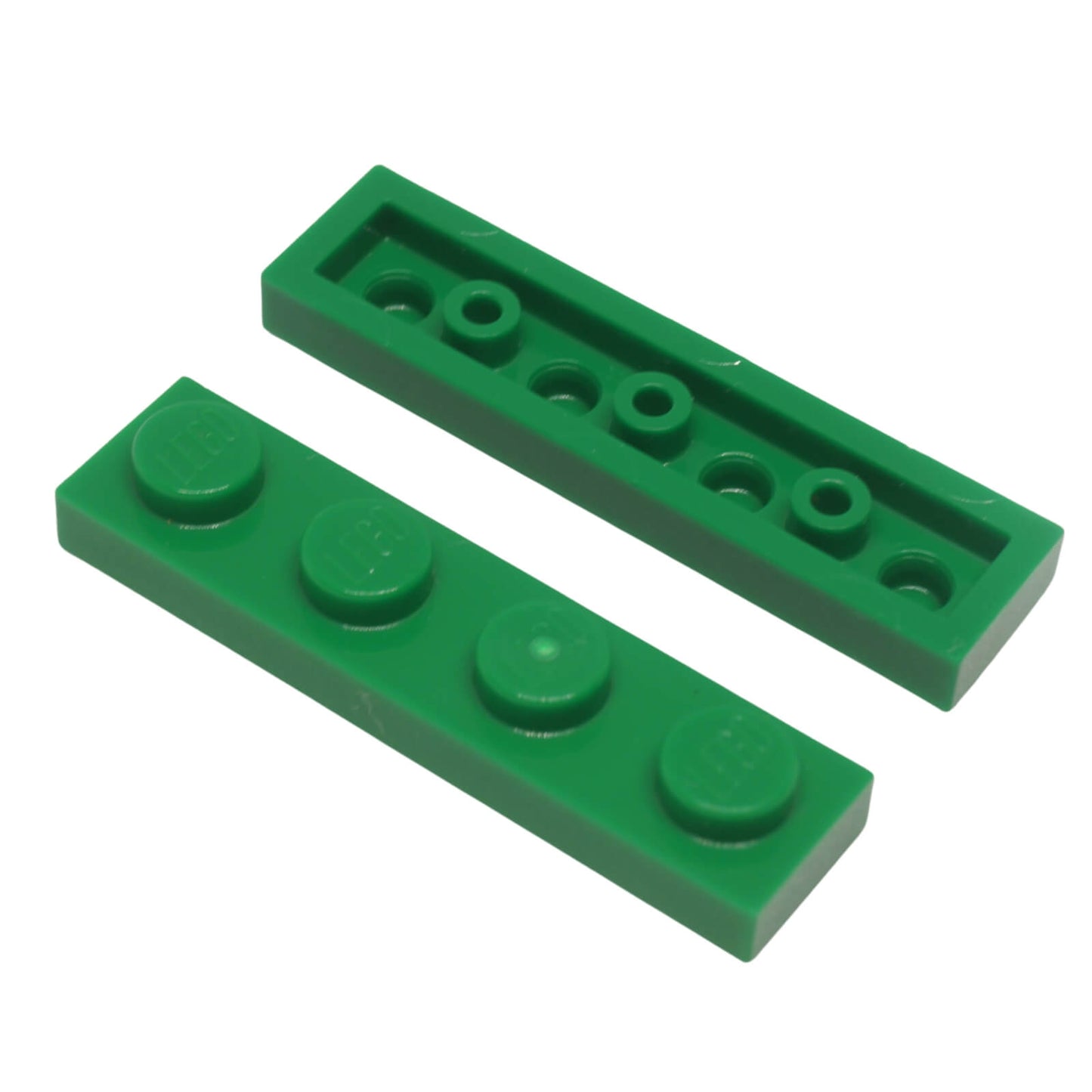Green LEGO Plate 1 x 4 part 3710 with four top studs and underside tube structure
