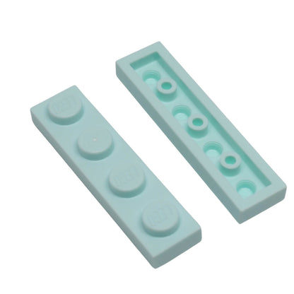 Light Aqua LEGO Plate 1 x 4 part 3710 with four top studs and underside tube structure
