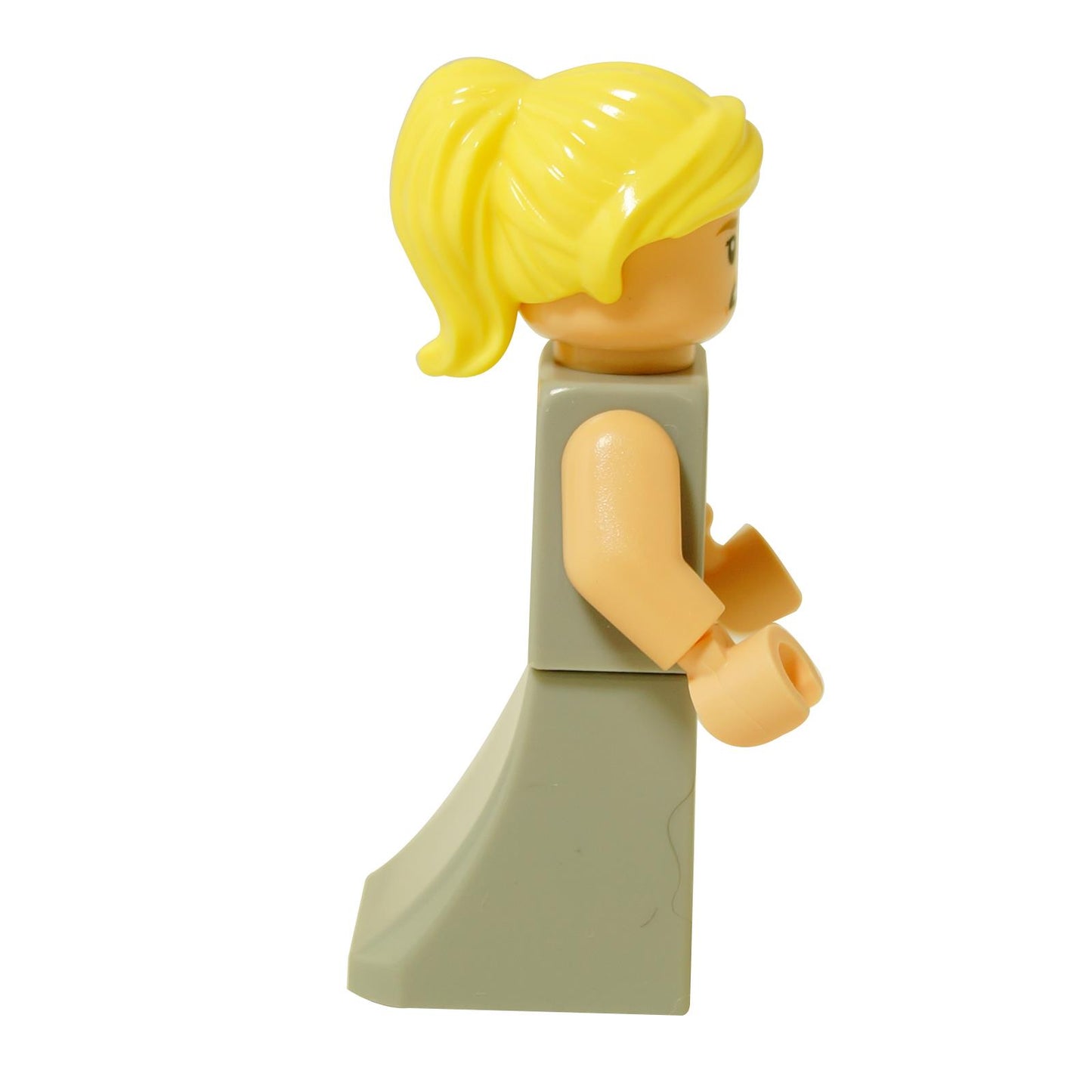 Seitenansicht der LEGO Fleur Delacour Mini-Puppe, die den nach hinten gekämmten gelben Pferdeschwanz und das abfallende Kleidungsstück zeigt.