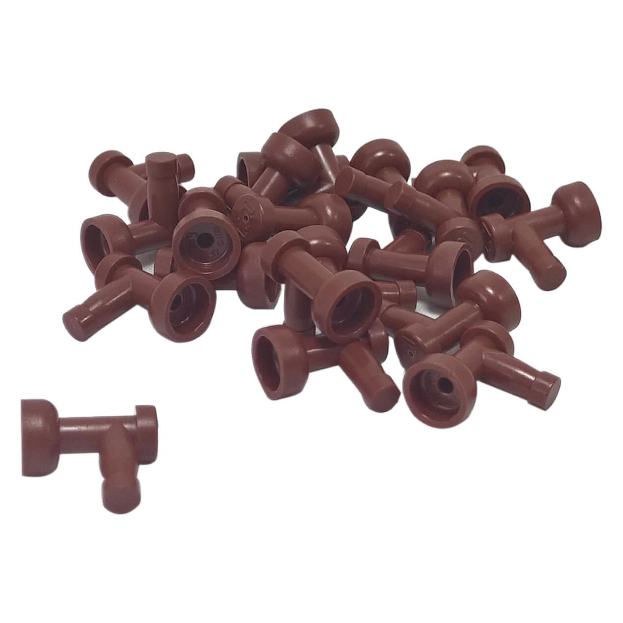 A pile of numerous reddish brown LEGO Part 4599b (Tap 1 x 1 without Hole in End) pieces scattered against a white background, showing their T-shape with a flared cup end.