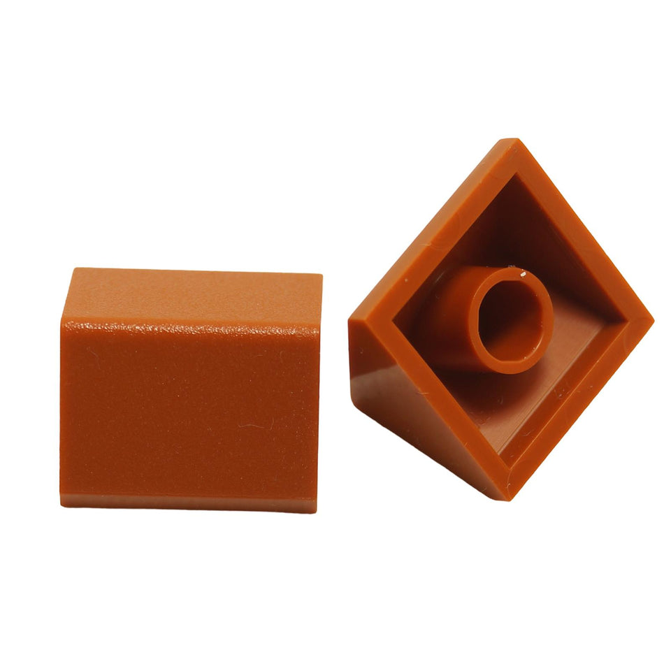 Dark orange 45 degree 2x2 double slope brick, part 3043, with smooth angled surfaces