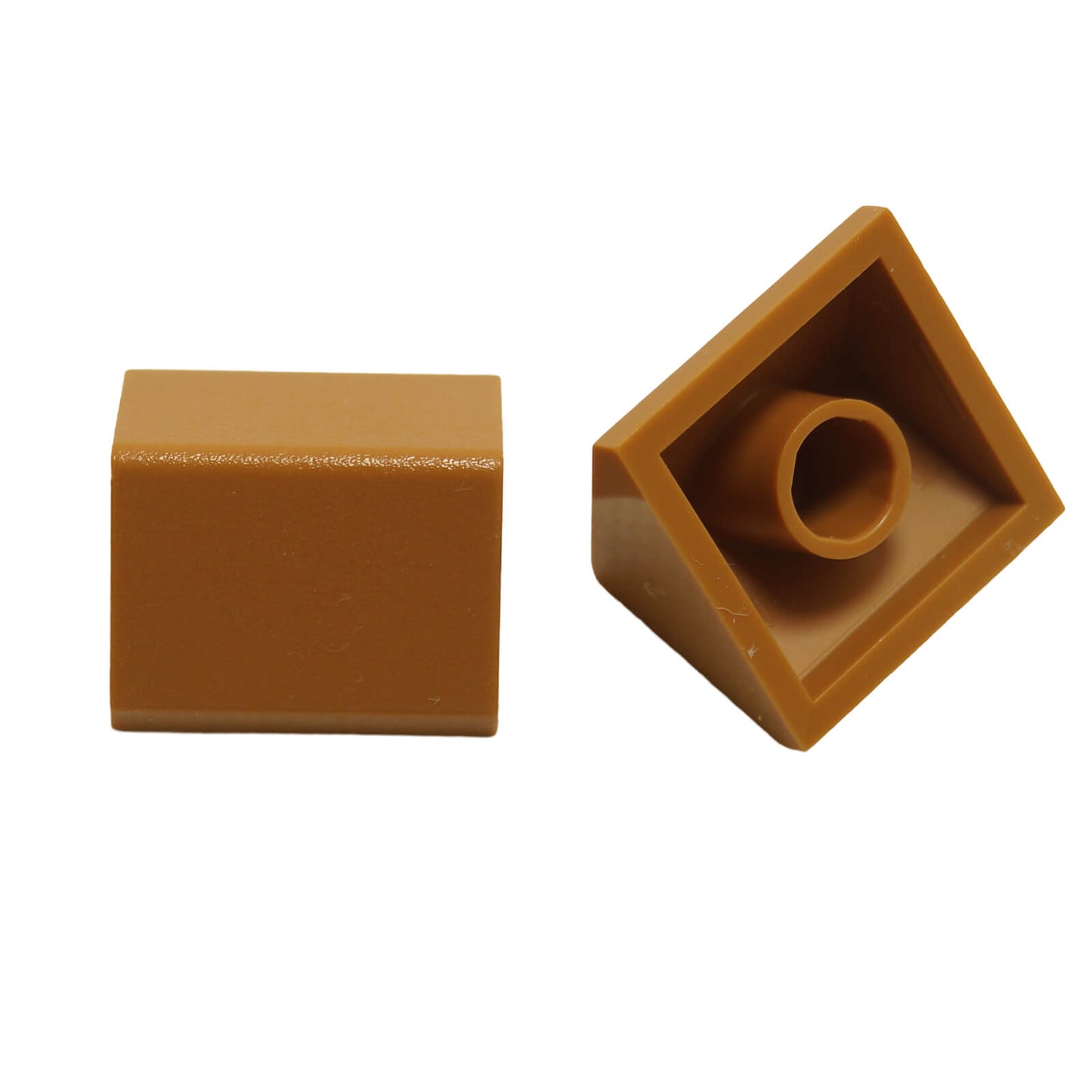 Medium nougat 45 degree 2x2 double slope brick, part 3043, with smooth angled surfaces