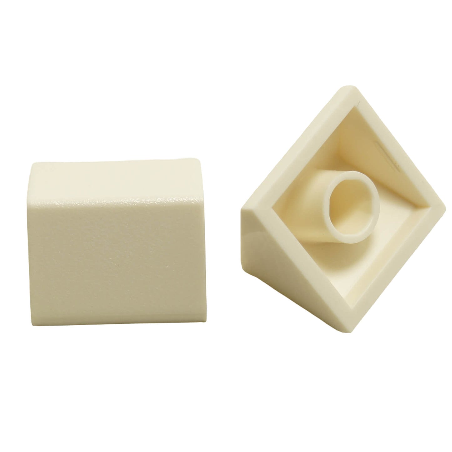 White 45 degree 2x2 double slope brick, part 3043, with smooth angled surfaces