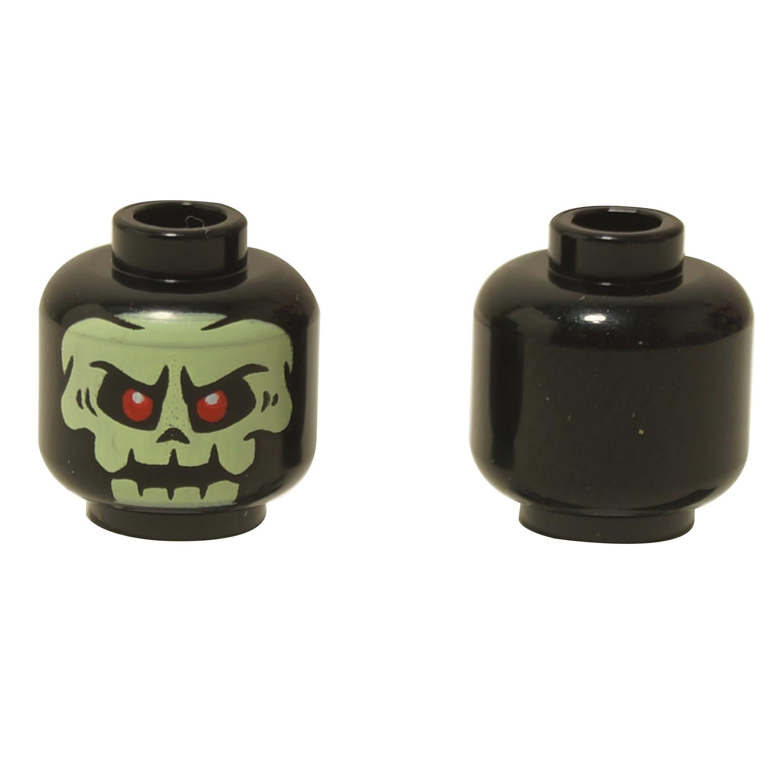 Front and back views of the LEGO® minifigure head (3626pb3198) in black, featuring a yellowish green alien skull design with glowing red eyes and menacing expression.