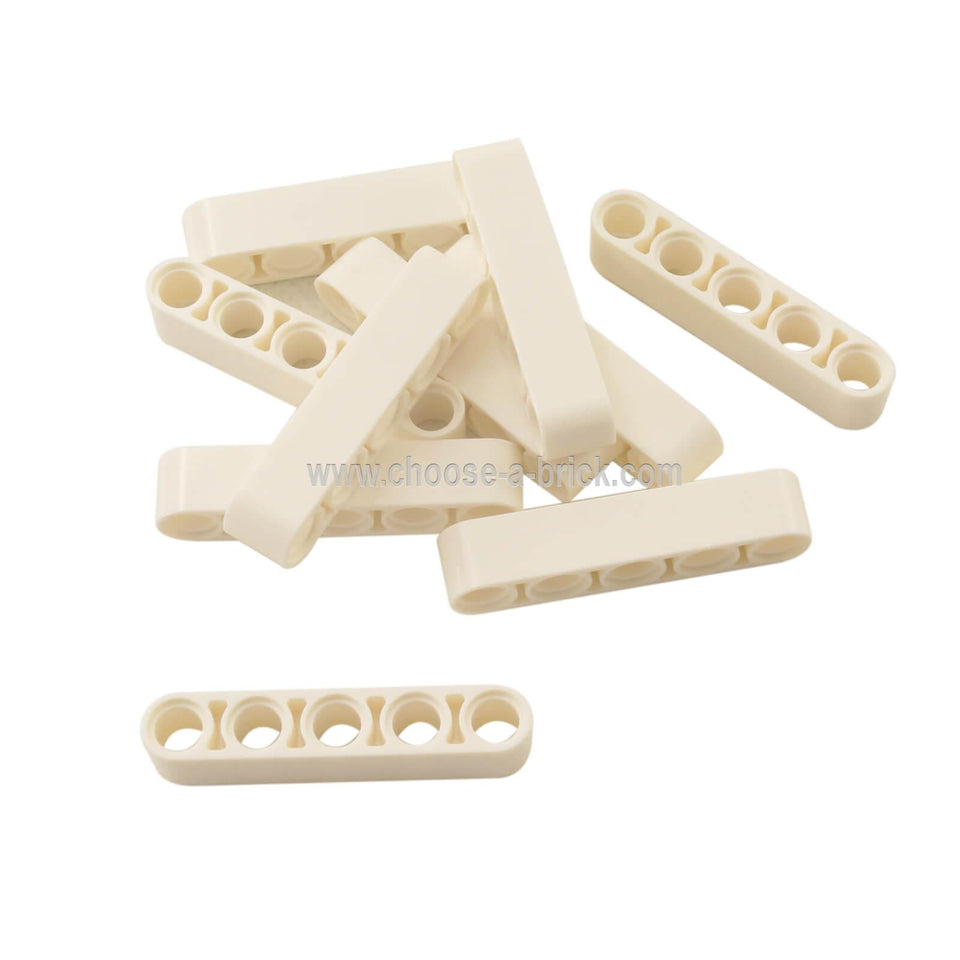 White LEGO Technic 1x5 Thick Liftarm pieces (32316) arranged loosely.