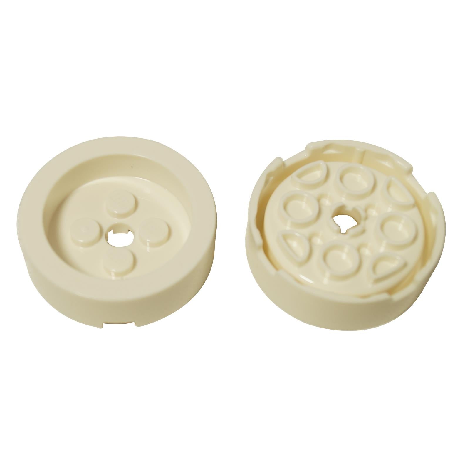 LEGO® round brick 4 x 4 with recessed center and axle hole in white, part 68325.