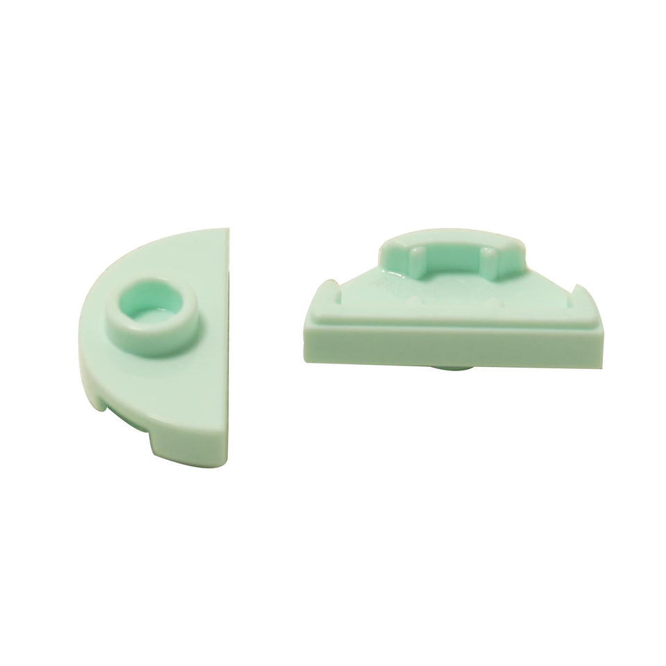 Two light aqua LEGO Plate 1x2 Half with 1 Stud (Jumper) pieces (1745) shown front and side.