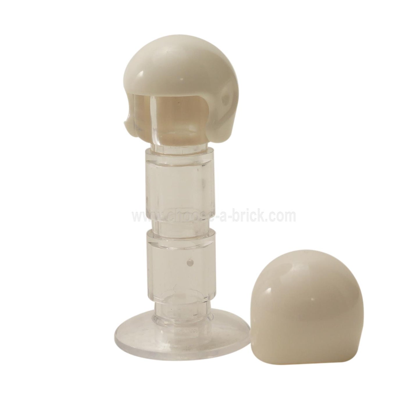 LEGO® Sports & Flight Helmet 93560 in white, displayed on transparent stand with spare helmet beside it.