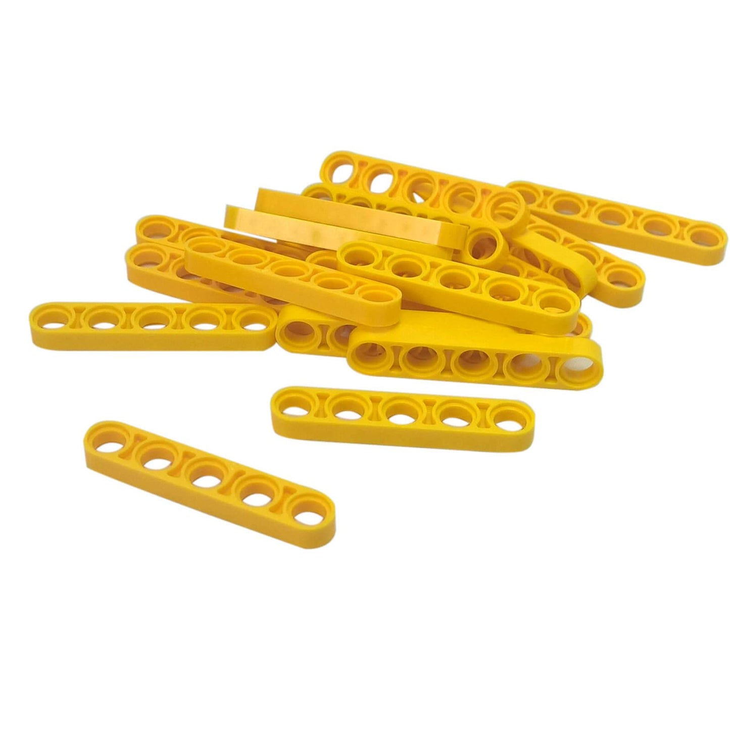 Pile of bright yellow LEGO Technic Liftarm 1x5 Thin pieces (32017) spread out against white.