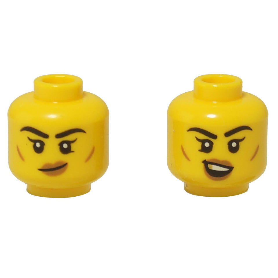 Two yellow LEGO female minifigure heads showing dual expressions: one smug, one smiling widely.
