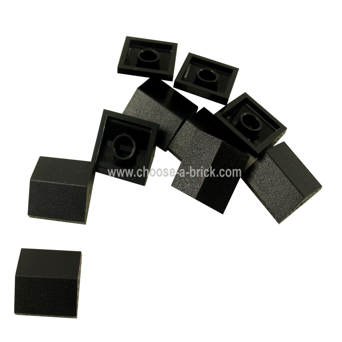 Several black LEGO Slope 33 2 x 2 Double 3300 pieces.
