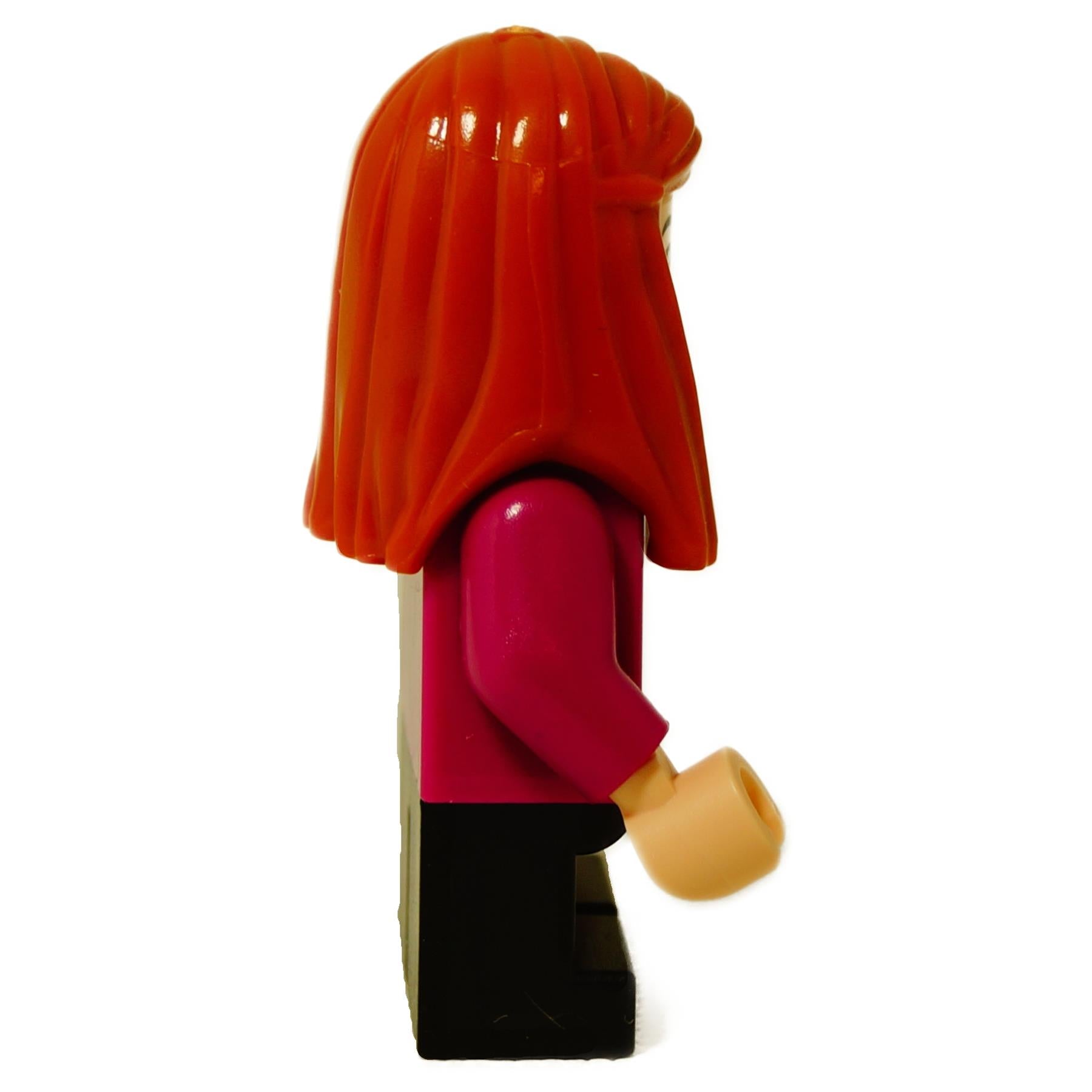 Side view of LEGO Ginny Weasley minifigure showing long red hair and magenta top with dark pants.