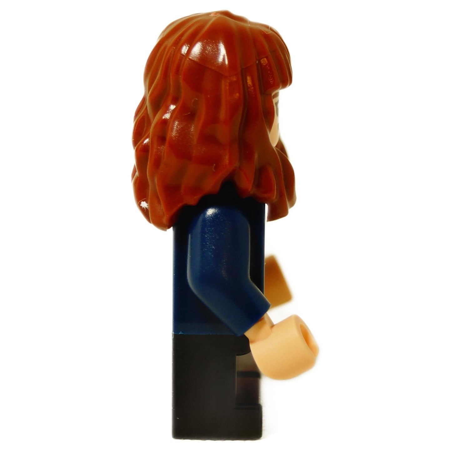 Side view of LEGO Hermione Granger minifigure showing her long wavy red hair and dark blue cardigan over a blue sweater.