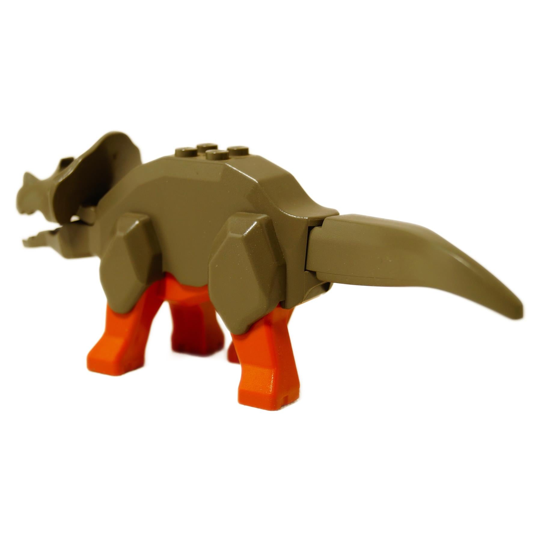LEGO Toy triceratops dinosaur model made from interlocking bricks on a white background, rear profile view