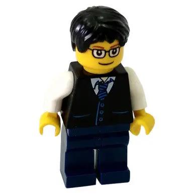 LEGO businessman minifigure in black vest and glasses, front view