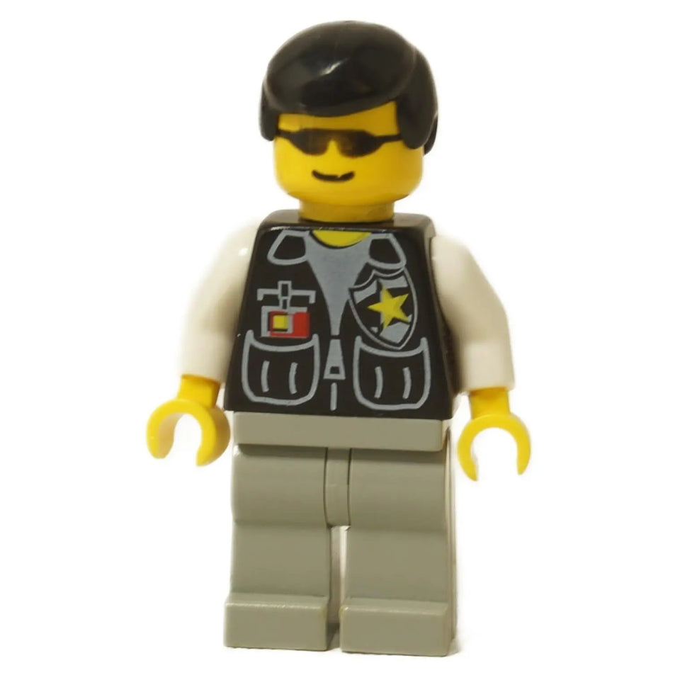 LEGO Police Sheriff minifigure (cop037) wearing sunglasses, a black vest with a yellow star badge, a white shirt, light gray legs, and black hair.