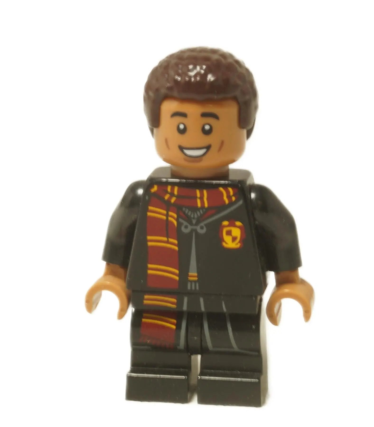  LEGO® Harry Potter™ Dean Thomas minifigure (colhp08) wearing his Gryffindor robes and scarf, front view.