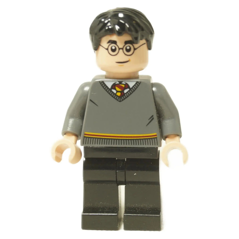  LEGO® Minifigura de Harry Potter (hp220) con su suéter gris de Gryffindor, gafas características y pantalones negros.