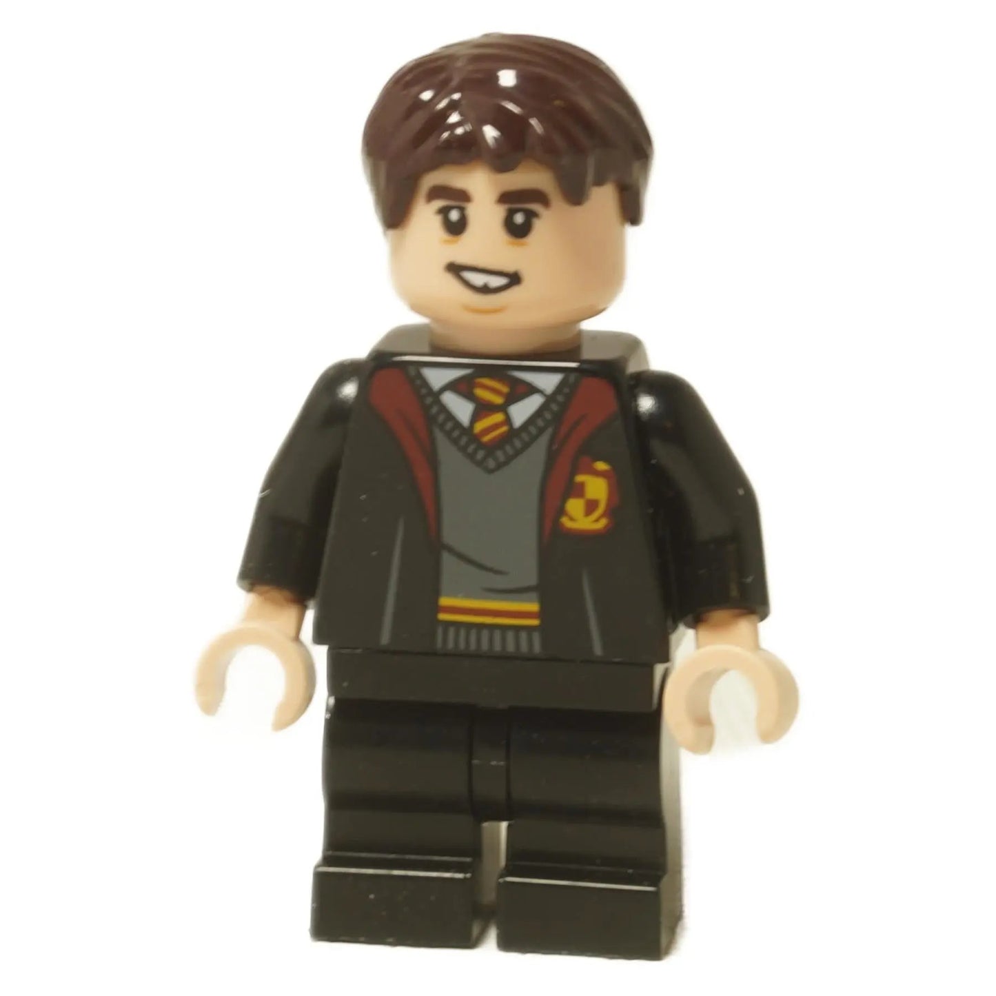 LEGO® Minifigura de Harry Potter Neville Longbottom (hp330) con túnicas de Gryffindor, mostrando su cabeza de doble cara con expresiones de sonrisa y preocupación.