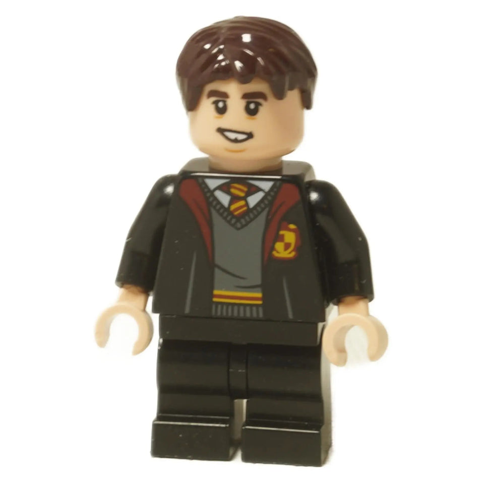 LEGO® Minifigura de Harry Potter Neville Longbottom (hp330) con túnicas de Gryffindor, mostrando su cabeza de doble cara con expresiones de sonrisa y preocupación.