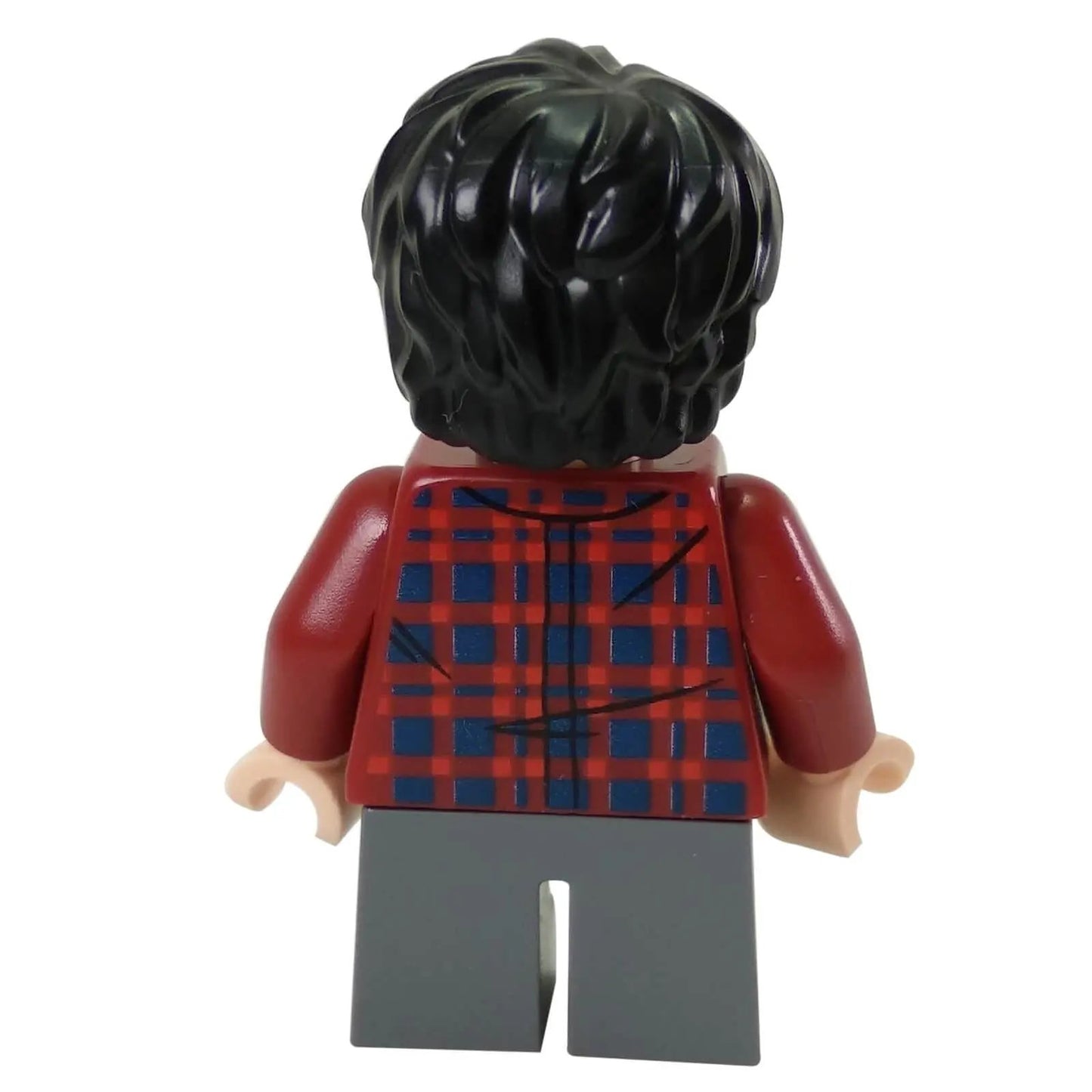 Rear view of the LEGO® Harry Potter™ minifigure (hp143) showing black tousled hair and dark red plaid shirt with back print detail.