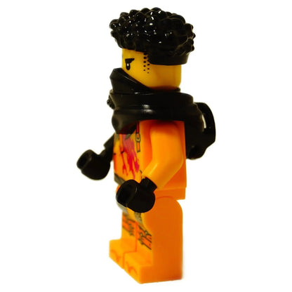 Side view of LEGO Ninjago Arin minifigure showing black curly hair, black shoulder armor, and orange suit detail.