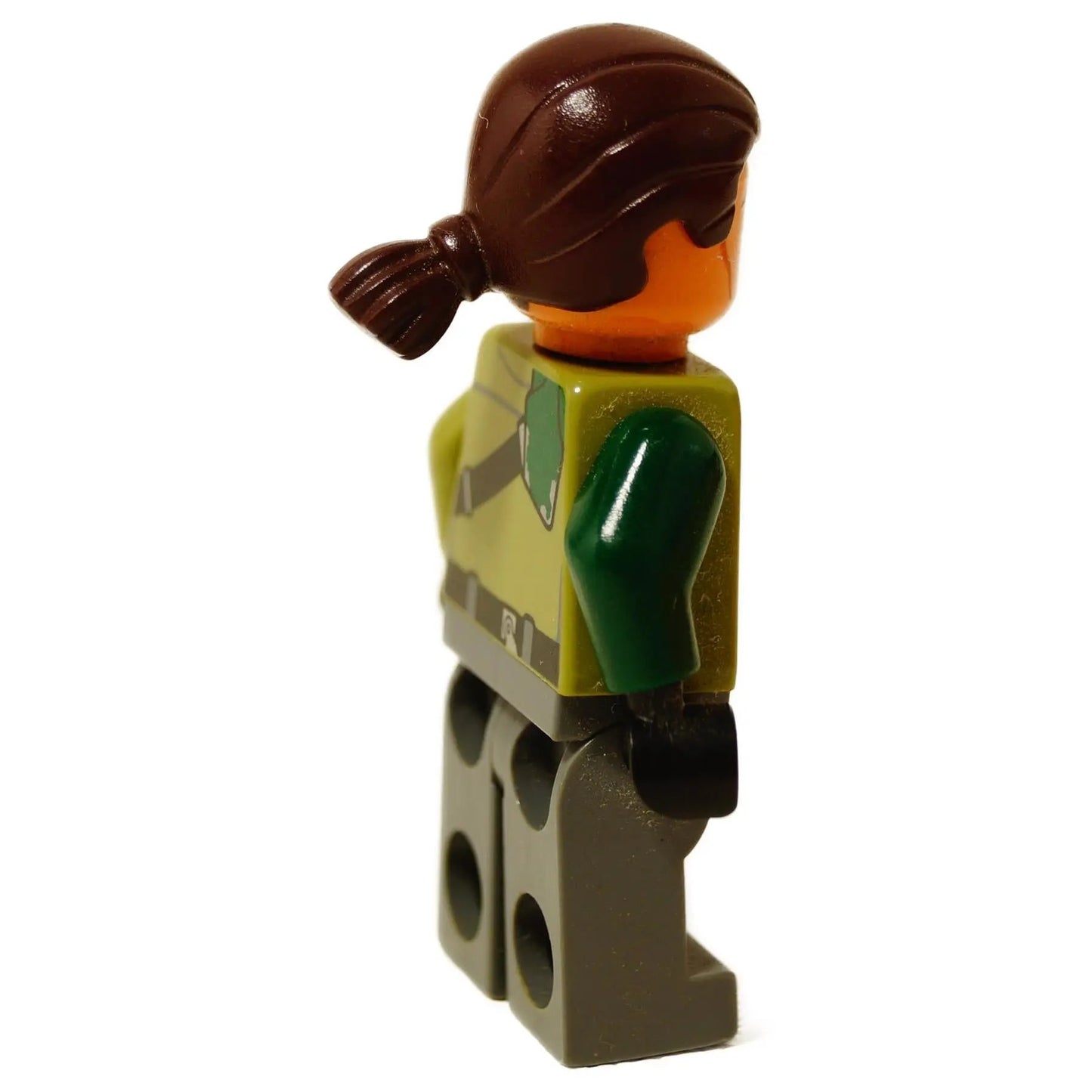 Side view of LEGO Kanan Jarrus minifigure showing dark brown ponytail and diagonal dark strap across his torso.