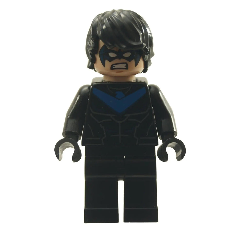 A LEGO® minifigure of Nightwing in his Rebirth suit, featuring black hair, a light nougat head with a blue mask and angry expression, a black torso with blue Nightwing emblem and dark grey muscle printing, black arms, black hands, and black legs, standing against a white background.