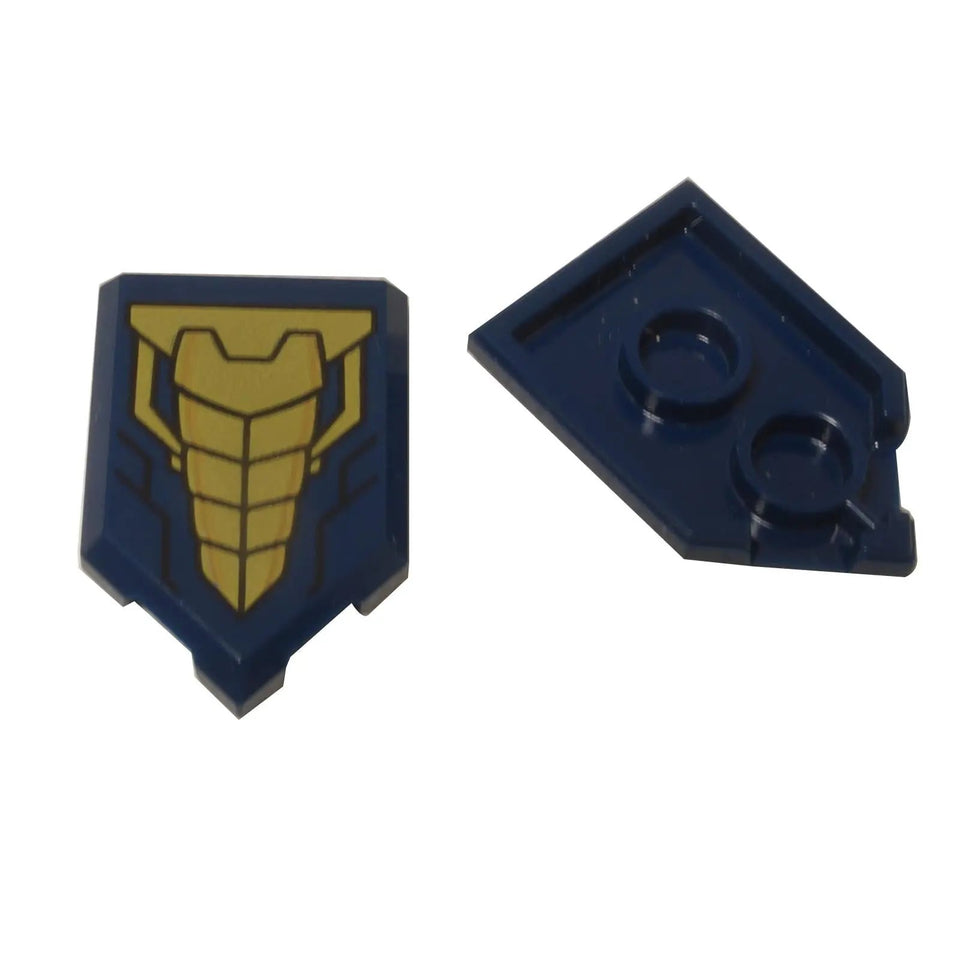LEGO® sci-fi armor shield tile (22385pb183) with a segmented gold chest plate design on a dark blue pentagonal tile.